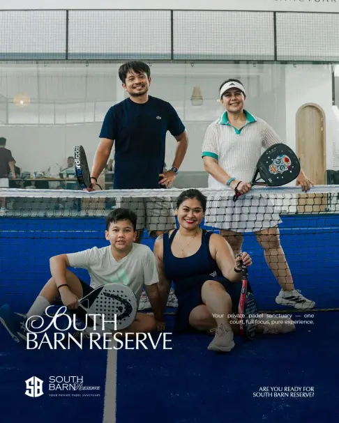 A family posing at the net with their padel rackets