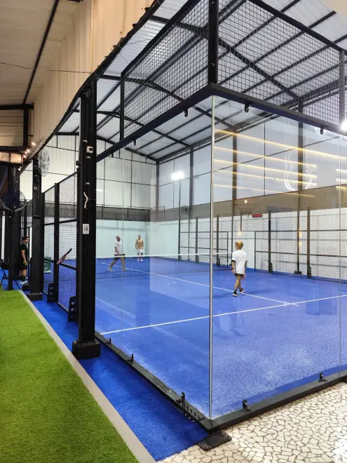 Glass-walled court seen from the corner