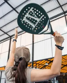 Player reaching for an overhead
